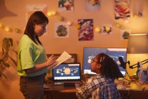 black woman helping daughter with homework 2025 03 09 00 42 01 utc min