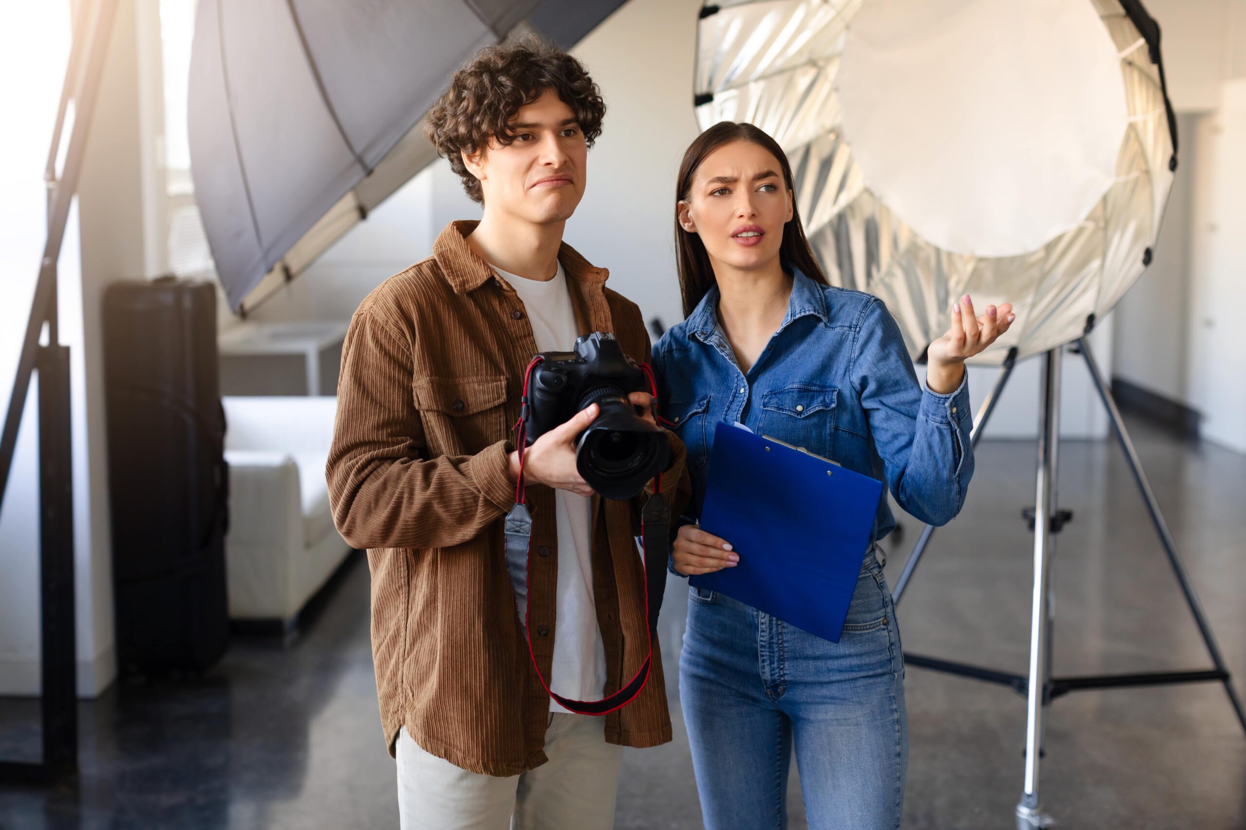 photographer and assistant discussing shoot in stu 2025 03 18 17 10 17 utc min